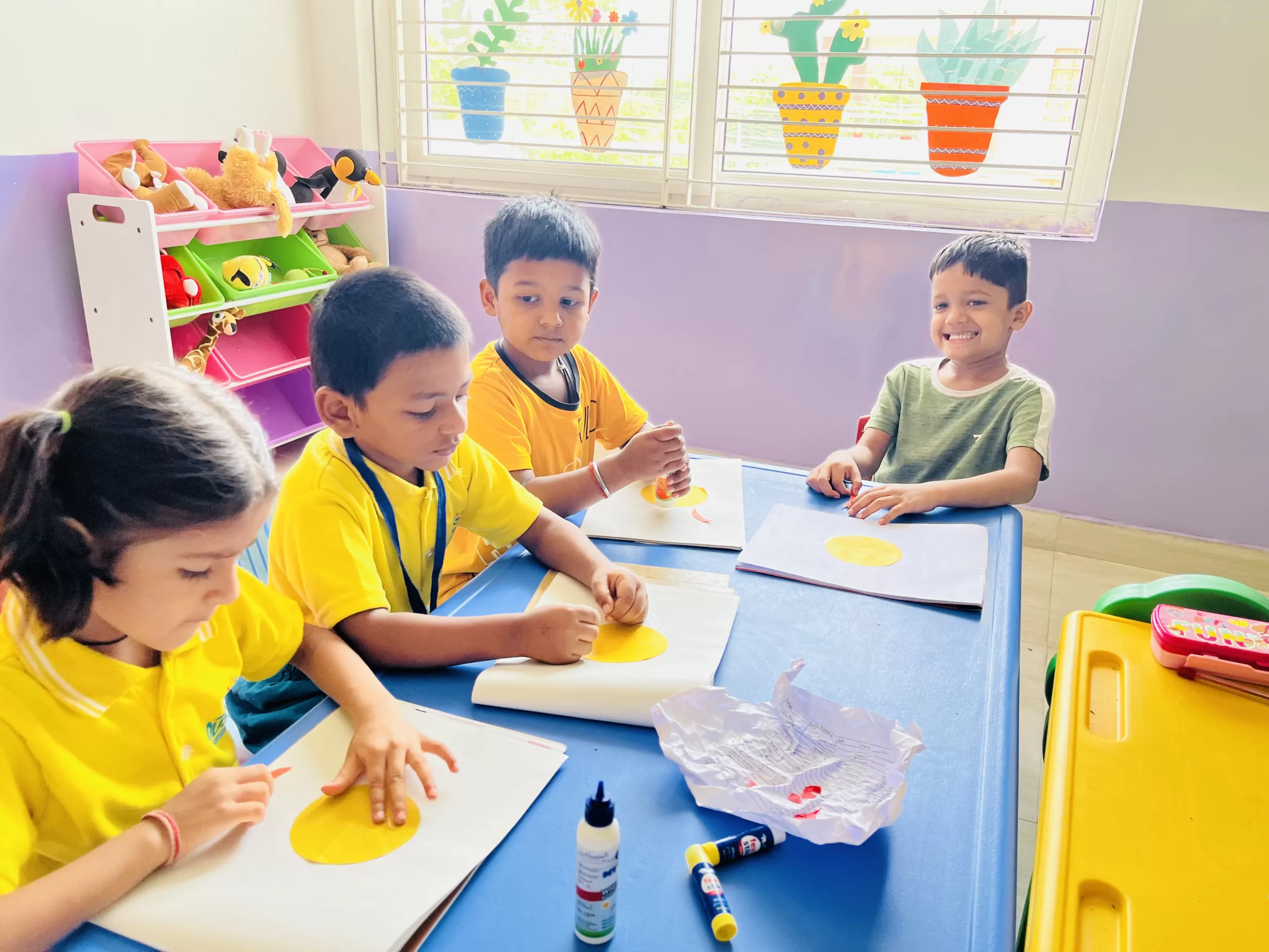 Kids Sitting in a preschool