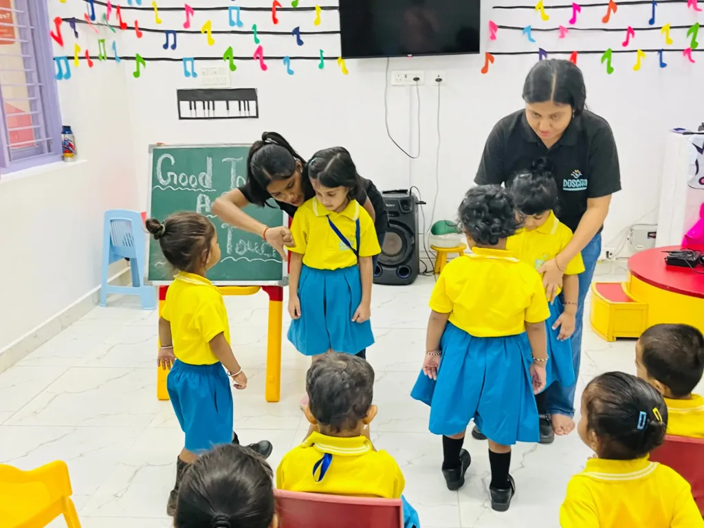 Teacher are teaching good tough to children's