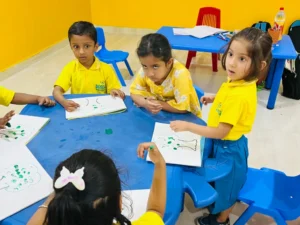 Children engaged in creative activities at Duscha Preschool, showcasing how daycare environments boost kids' learning.